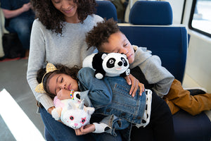 Panda Snuggle Glove Travel Pillow for Kids on train